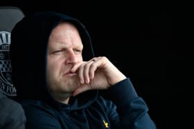 Hearts sacked Steven Naismith, pictured in the dugout at St Mirren, after a run of eight successive defeats.