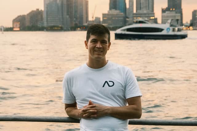 Andy Donaldson in front of the Manhattan skyline