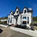 The Strone Inn is described by the sellers as a 'perfect lifestyle business' opportunity on a prominent waterfront plot with outstanding Scottish views