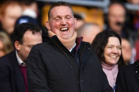 Former Scotland player Doddie Weir laughs while chatting with Princess Anne, out of the picture, at the 2020 Six Nations match between Scotland and France (Picture: Andy Buchanan)