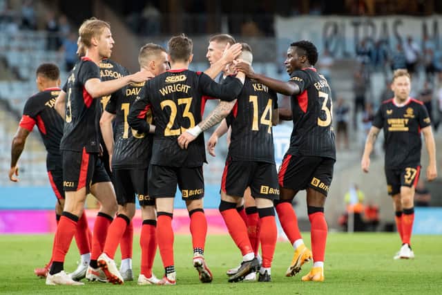 Rangers players celebrate Steven Davis' last-gasp goal against Malmo in 2021. Cr: SNS Group.
