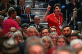 A young delegate heckles Keir Starmer during the Prime Minister's speech to the Labour party conference (Picture: Oli Scarff)