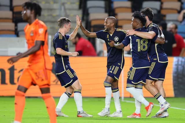 Ryan Gauld, far left, captained Vancouver Whitecaps to glory.