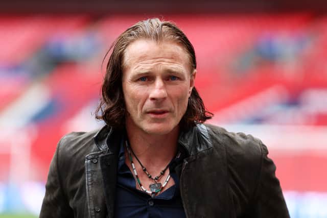 Gareth Ainsworth is reportedly interested in the Hearts job.