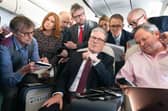 'Free gear' Keir Starmer talks to journalists as he flies to Washington for talks with US President Joe Bide (Picture: Stefan Rousseau/WPA pool)