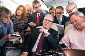 'Free gear' Keir Starmer talks to journalists as he flies to Washington for talks with US President Joe Bide (Picture: Stefan Rousseau/WPA pool)
