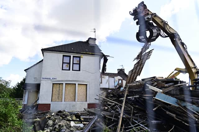 Demolition begins in Tannahill. PIC: John Devlin.