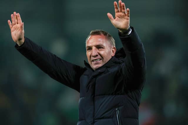 Brendan Rodgers takes the acclaim of the Celtic fans.