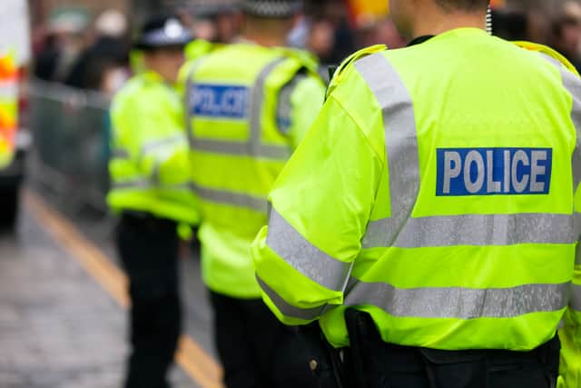 The Met Police are investigating the incident, which occurred outside a school in west London