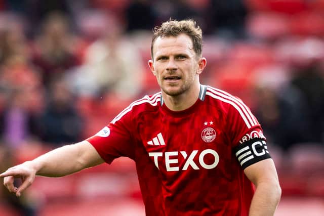 Nicky Devlin of Aberdeen has also been included.