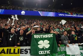 Celtic fans show their support in the stands prior to the UEFA Champions League clash in Dortmund.