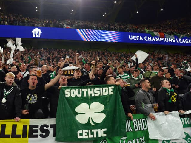 Celtic fans show their support in the stands prior to the UEFA Champions League clash in Dortmund.