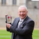 Former Scotland and Rangers footballer Ally McCoist after being made an OBE during an investiture ceremony at Windsor Castle, Berkshire. 