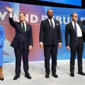 From left, Tory leadership candidates Kemi Badenoch, Robert Jenrick, James Cleverly and Tom Tugendhat stand together on stage after delivering their speeches during the Conservative Party Conference at the International Convention Centre in Birmingham