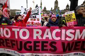 People take part in a Stand Up To Racism protest in Glasgow's George Square (Picture: Jeff J Mitchell)