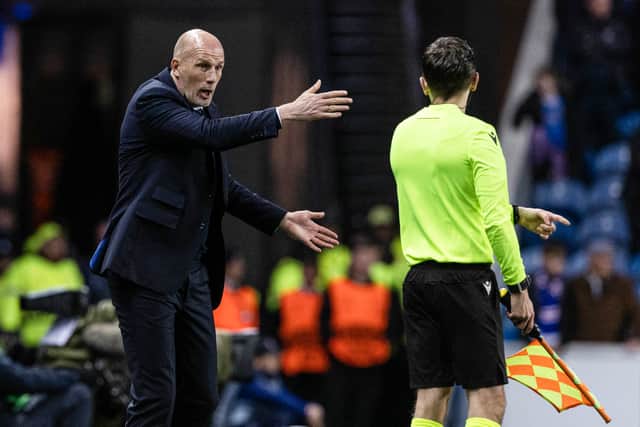 Rangers manager Philippe Clement speaks to the linesman during the defeat by Lyon.