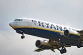A woman was charged after a disturbance on a flight arriving at Edinburgh Airport on Tuesday morning.