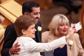 Former Scottish First Ministers Nicola Sturgeon and Humza Yousaf pose for a selfie during the 25th Anniversary celebrations of the Scottish Parliament at Scottish Parliament Building on Saturday last week (Picture: Jeff J Mitchell)