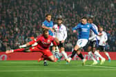 Tom Lawrence scores for Rangers against Lyon in the Europa League. Cr: Getty Images.