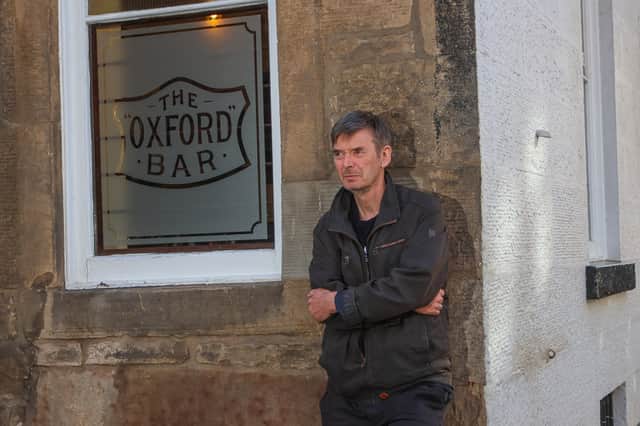 Ian Rankin outside at The Oxford Bar, the favourite haunt of his character John Rebus