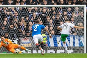 Rangers goalkeeper Jack Butland saves a penalty taken by Hibs striker Mykola Kukharevych. (Photo by Alan Harvey / SNS Group)