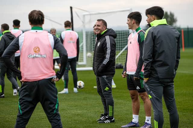 Celtic manager Brendan Rodgers is all smiles as he takes training.