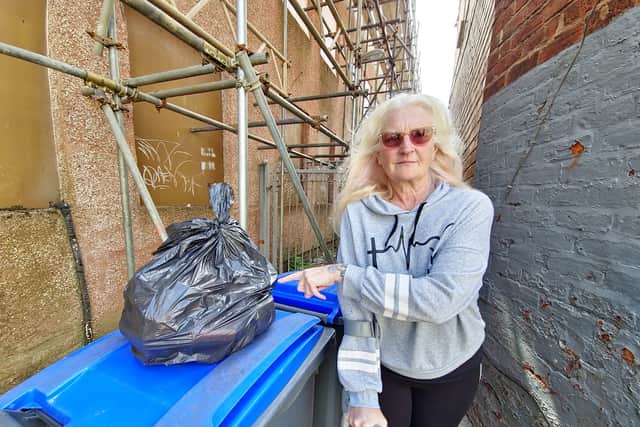 Annie Valentine is sick of people putting rubbish in the recycling bins.