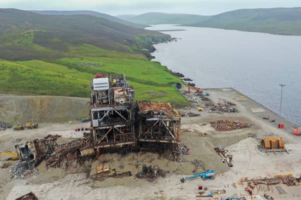 A partially dismantled oil rig lies on the shore near Lerwick, Shetland (Picture: William Edwards)