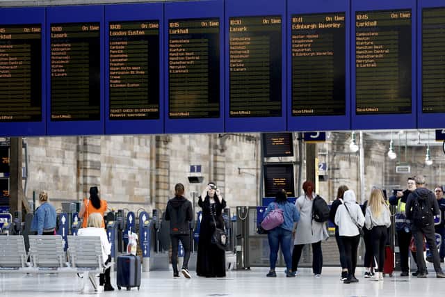 Passengers make their way through Glasgow Central station. Picture: Jeff J Mitchell/Getty Images