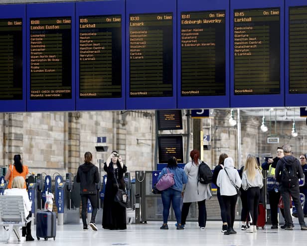 Passengers make their way through Glasgow Central station. Picture: Jeff J Mitchell/Getty Images