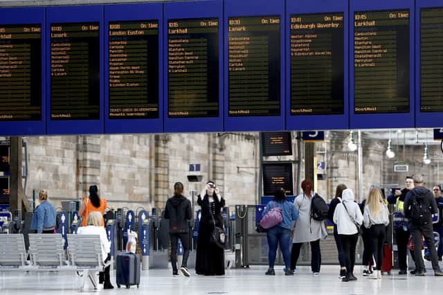 Passengers make their way through Glasgow Central station. Picture: Jeff J Mitchell/Getty Images