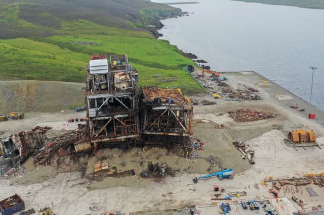 A partially dismantled oil rig lies on the shore near Lerwick, Shetland (Picture: William Edwards)