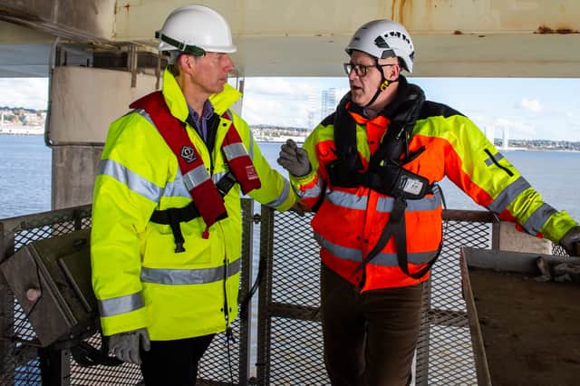 Alastair Dalton talks to bridge manager Alan Hutchison on the scissor lift