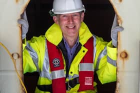 The Scotsman's Transport Correspondent at one of the tiny hatches providing access to the inside of the Tay Road Bridge