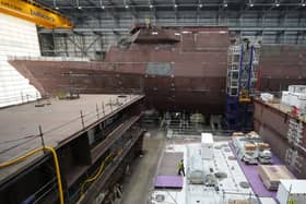 Construction work has begun on the third of five Type 31 ships HMS Formidable. Pictured is work continuing on HMS Venturer(top) and HMS Active in the Venturer building ahead of the Steel Cut ceremony for the Royal Navy's third in class Type 31 frigate, HMS Formidable, at Babcock International Group, in Rosyth.