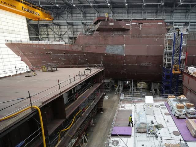 Construction work has begun on the third of five Type 31 ships HMS Formidable. Pictured is work continuing on HMS Venturer(top) and HMS Active in the Venturer building ahead of the Steel Cut ceremony for the Royal Navy's third in class Type 31 frigate, HMS Formidable, at Babcock International Group, in Rosyth.