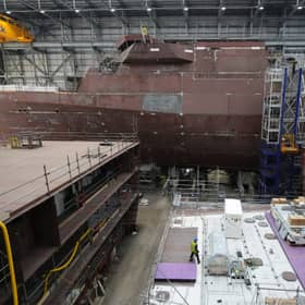 Construction work has begun on the third of five Type 31 ships HMS Formidable. Pictured is work continuing on HMS Venturer(top) and HMS Active in the Venturer building ahead of the Steel Cut ceremony for the Royal Navy's third in class Type 31 frigate, HMS Formidable, at Babcock International Group, in Rosyth.