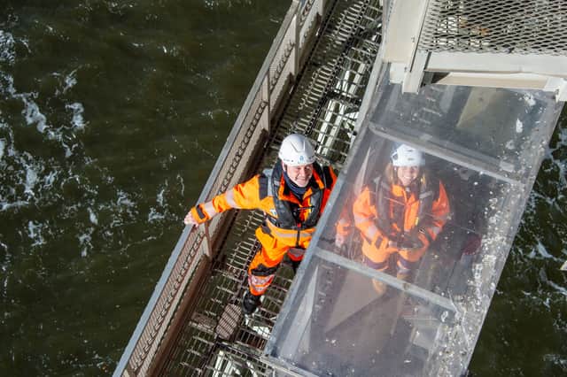 Bridge operatives Graeme Simpson and Yvonne Rice on the underbridge inspection gantry 
