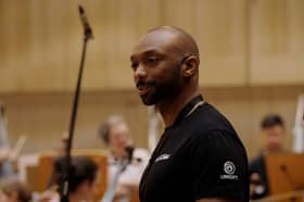 Star Wars Outlaws composer Wilbert Roget while recording the game's score with the Royal Scottish National Orchestra.