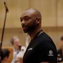 Star Wars Outlaws composer Wilbert Roget while recording the game's score with the Royal Scottish National Orchestra.