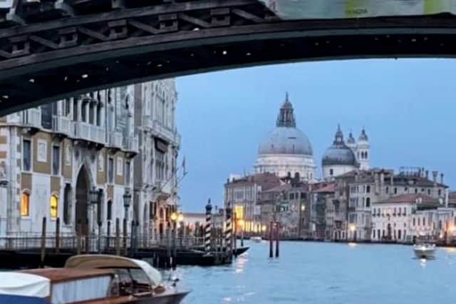 This couple travelled a collective 2,300 miles for their first date in Venice, Italy after talking online for a month. Picture: Nafis Delowar/SWNS