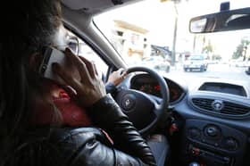 Using a mobile phone while driving dramatically increases he chance of having a crash (Picture: Pascal Pochard-Casabianca)