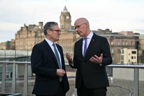 Prime Minister Sir Keir Starmer speaks with First Minister John Swinney during the Council of the Nations and Regions in Edinburgh. Picture: Andy Buchanan/PA Wire