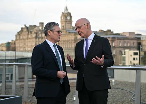 Prime Minister Sir Keir Starmer speaks with First Minister John Swinney during the Council of the Nations and Regions in Edinburgh. Picture: Andy Buchanan/PA Wire