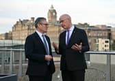 Prime Minister Sir Keir Starmer speaks with First Minister John Swinney during the Council of the Nations and Regions in Edinburgh. Picture: Andy Buchanan/PA Wire