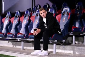 Scotland midfielder Lewis Ferguson looks on from the Bologna bench prior to the Serie A match against Atalanta at Stadio Renato Dall'Ara on September 28, 2024. (Photo by Alessandro Sabattini/Getty Images)