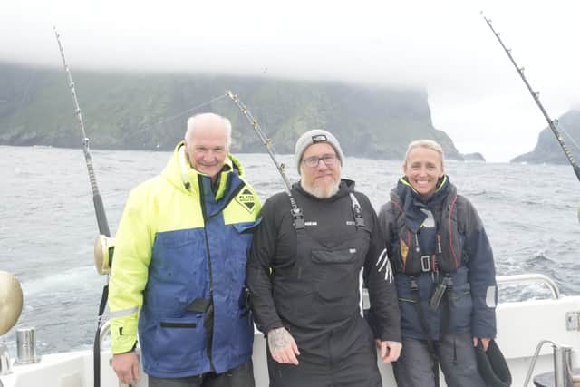 Skipper Angus Campbell, fisherman Andy Bolt, and associate professor in biology at the University of Exeter Dr Lucy Hawkes aboard Harmony near St Kilda