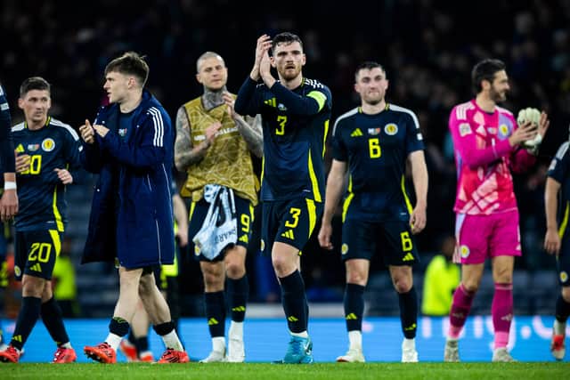 Scotland's players appear more comfortable in a 4-2-3-1 formation.