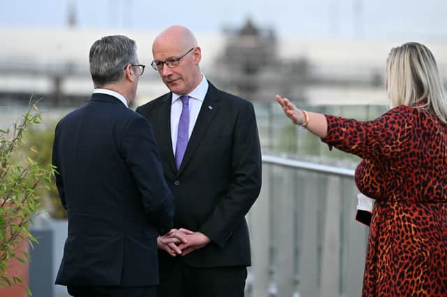 Keir Starmer and John Swinney in close conversation during the first Council of Nations and Regions meeting in Edinburgh (Picture: Andy Buchanan)