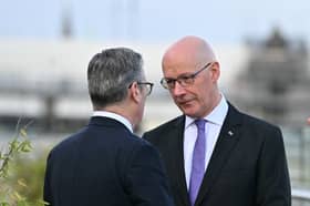 Keir Starmer and John Swinney in close conversation during the first Council of Nations and Regions meeting in Edinburgh (Picture: Andy Buchanan)